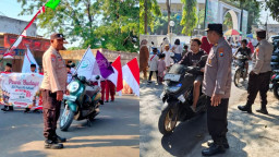 Kapolsek Grujugan Turun Langsung Kawal Pawai Budaya SD Plus Al Ishlah Bondowoso