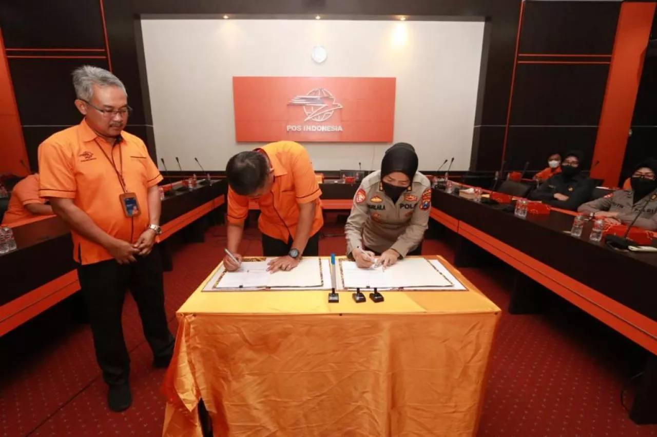 PT Pos Indonesia Tandatangani Perjanjian Kerjasama dengan Polda Jatim