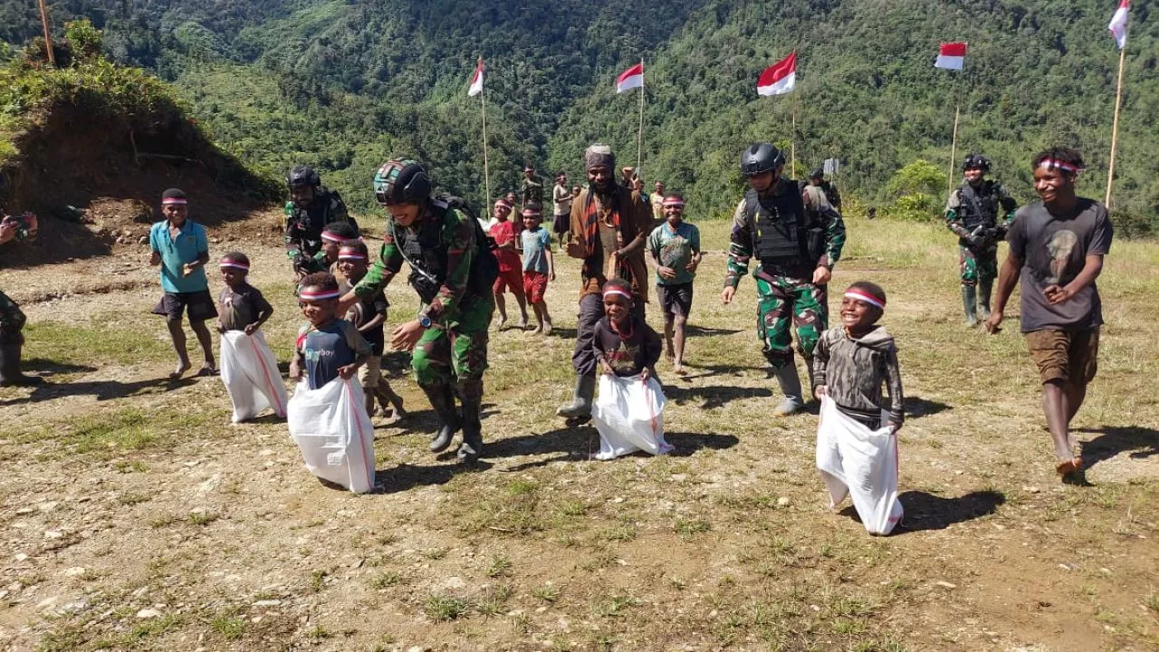 Satgas Yonif PR 433/JS Gelar Lomba di Distrik Yigi, Papua
