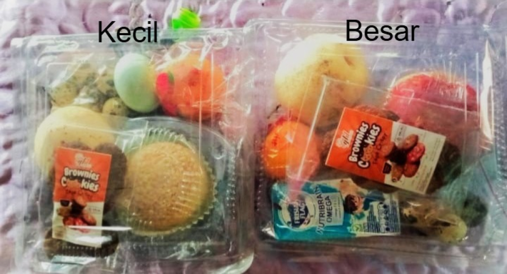 Menu MBG Ramadan yang dibagikan kepada siswa di SPPG Dadapan 2, Kec. Grujugan, Bondowoso, Jumat (27/2/2026), usai dilakukan evaluasi internal. Wali murid puas karena menu lebih variatif.