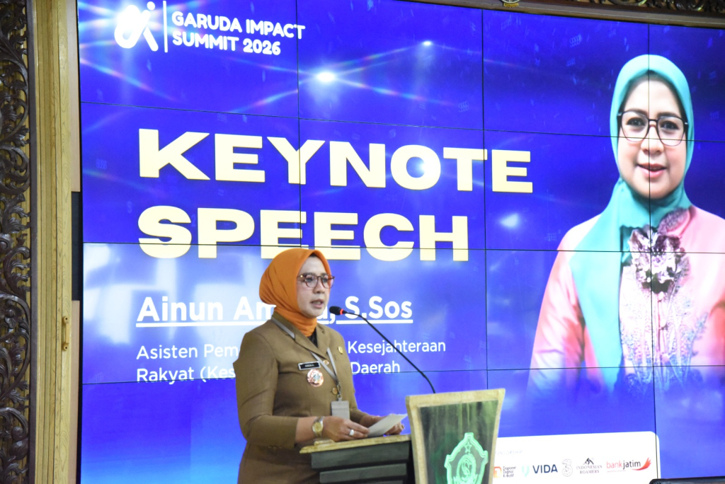 Ainun Amalia, Asisten Pemerintahan dan Kesejahteraan Rakyat Pemkab Sidoarjo tengah memberikan sambutan. Kabupaten Sidoarjo terpilih sebagai tuan rumah Garuda AI Impact Summit 2026 Regional Sidoarjo.
